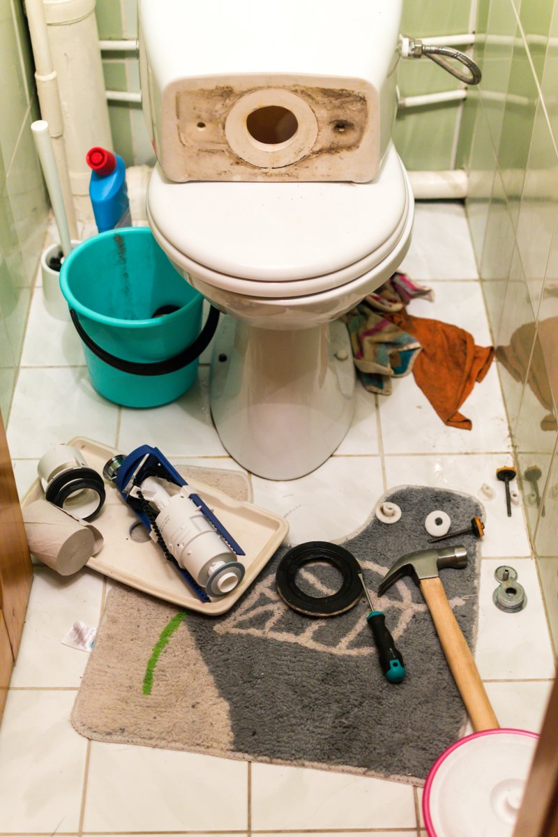 New toilet being installed in a Gidea Park bathroom
